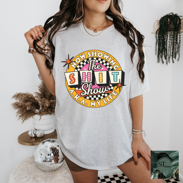 Now showing the sh*t show T-Shirt