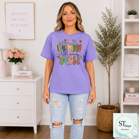 Helping Little Minds Grow Teacher T-Shirt | Cute Floral Teacher Graphic Tee | Preschool & Elementary Teacher Shirt | Unisex S-5XL
