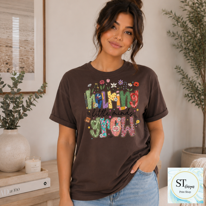 Helping Little Minds Grow Teacher T-Shirt | Cute Floral Teacher Graphic Tee | Preschool & Elementary Teacher Shirt | Unisex S-5XL