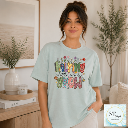 Helping Little Minds Grow Teacher T-Shirt | Cute Floral Teacher Graphic Tee | Preschool & Elementary Teacher Shirt | Unisex S-5XL