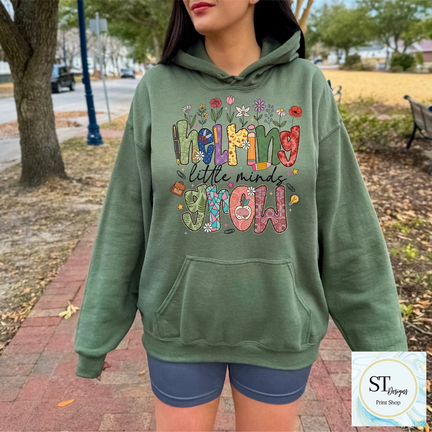 Helping Little Minds Grow Teacher T-Shirt | Cute Floral Teacher Graphic Tee | Preschool & Elementary Teacher Shirt | Unisex S-5XL