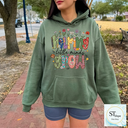 Helping Little Minds Grow Teacher T-Shirt | Cute Floral Teacher Graphic Tee | Preschool & Elementary Teacher Shirt | Unisex S-5XL